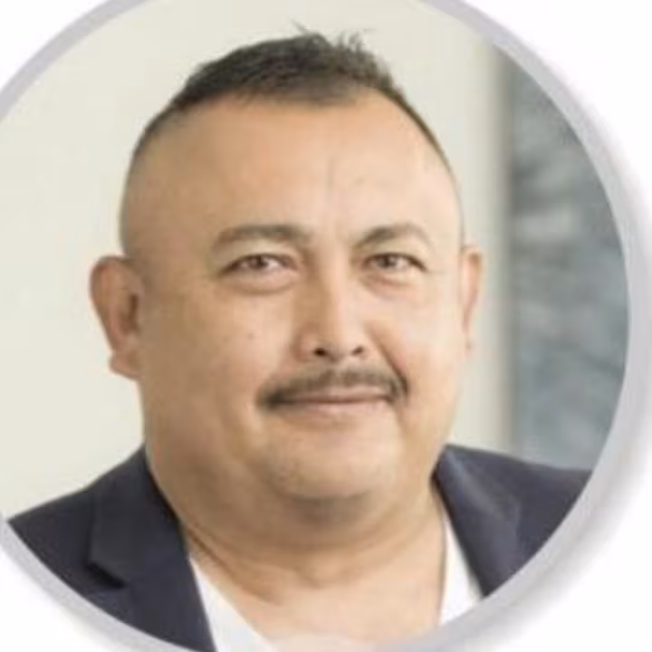 Sergio Carranza, photographed against a light studio background.